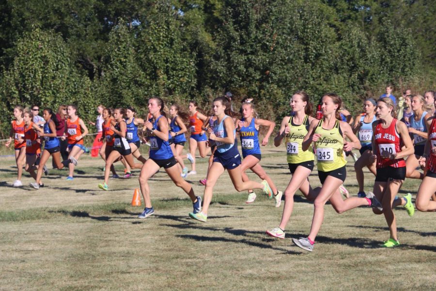 At+the+beginning+of+the+race+at+Living+Word+Church+on+Oct.+1%2C+junior+Natalie+Barnard+and+senior+Elissa+Barnard+are+in+the+lead.+Elissa+placed+15th+and+Natalie+placed+18th+at+the+State+Championship+last+year.