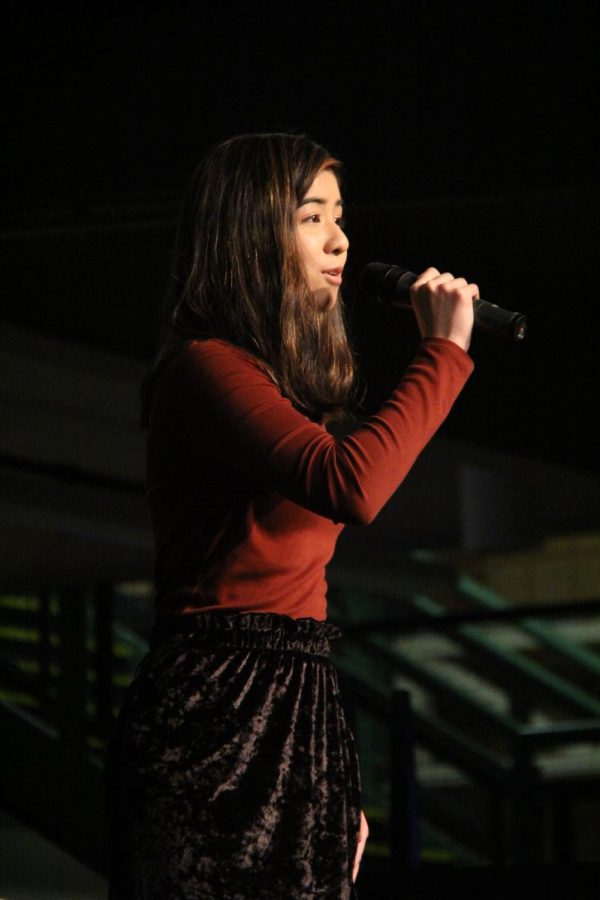Alumni Trina Makalintal sings for her act in 2017. Since coffee will not be served, for the past few years, the show has been called the Acoustic Variety Show which will fall on Nov. 10 at 7 p.m.