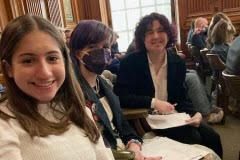 Sophomore Clara Bass sits with two other members of the Cultural Leadership group before the meeting. They had all prepared testimonys for the senators, which they were unable to share.