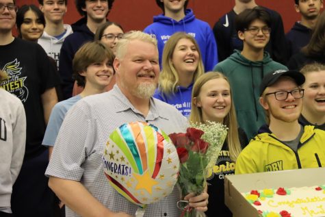After being surprised with the 2022-2023 Rose Award, fine arts teacher Jay Long takes a picture with his 7th Hour class. Long was one of 15 Rose Award winners, including  fine arts Traci Bolton, who was congratulated moments before. 