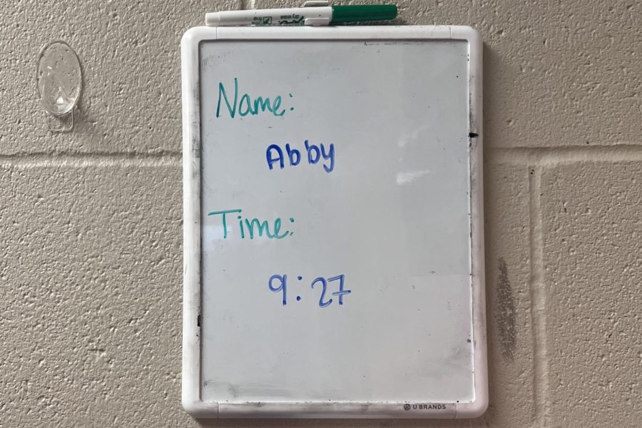 Math teacher Patricia Mabie has her own procedures of running the hall pass systems in her classroom. In order to keep track of where students are, she has them write down their name on a white board when they take a pass to go use the restroom.