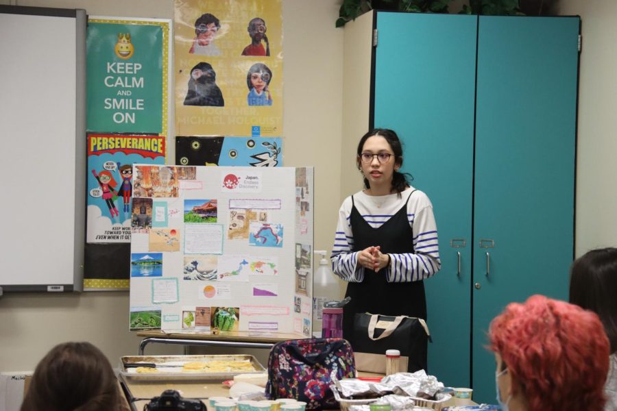 In November of 2022, freshman Akiko Field presents her poster on Japan for AP Human Geographys project called the Cultural Cookbook. Field is one of the lead volunteers for International Day on April 6 and will be displaying the same poster from the project during the event, along with teaching Origami. 