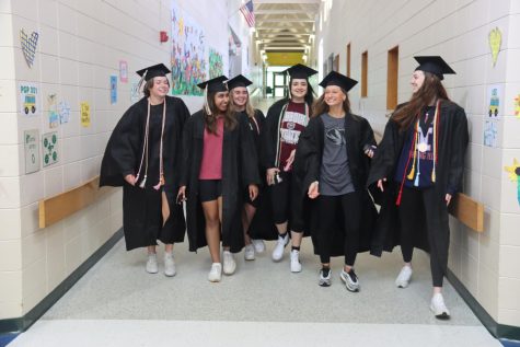 After the mandatory Graduation Practice last year, the Class of 2022 had the opportunity to walk through their former elementary and middle schools in their cap and gowns to visit previous classrooms and teachers.