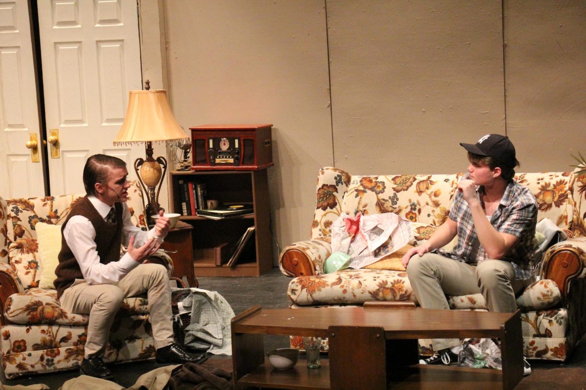 Junior Blake Jaycox, as Felix Unger, complains to senior Ben Dimmic playing Oscar Madison, about his divorce. Despite there being no school, LTC still rehearsed on Oct. 9.