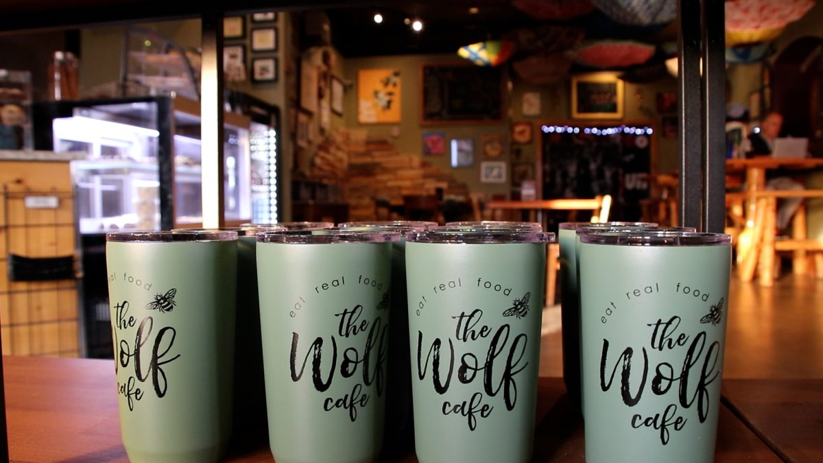 The Wolf Cafes interior sells their own reusable cups, helping toward them going zero waste.