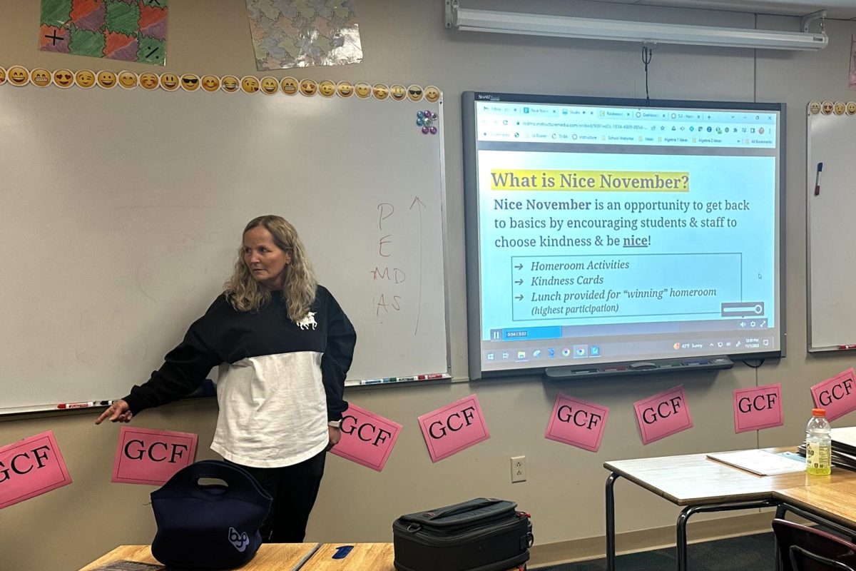 In her Homeroom, math teacher Cheryl Zimmerman shows her class a video explaining Nice November. All teachers were encouraged to show the video in their AcLab Homerooms. 
