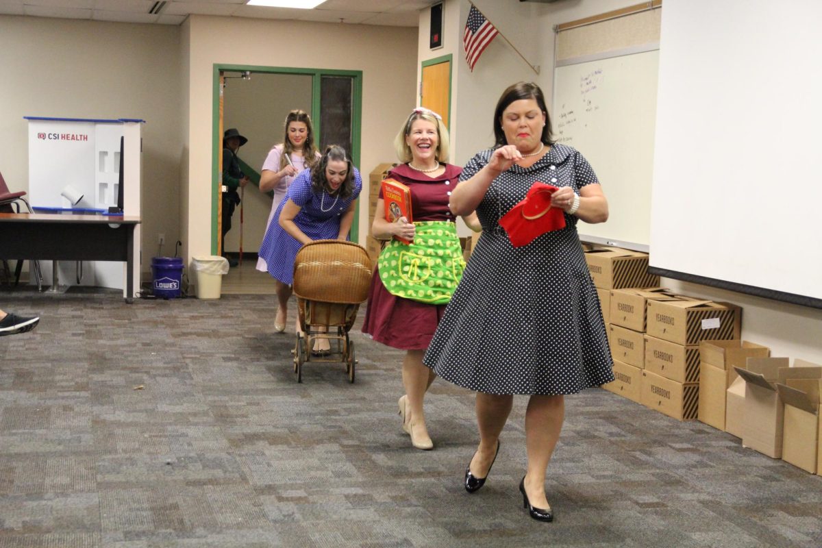 Entering the competition as a FACS Department, their costumes are representative of stay-at-home moms from the 50s. They followed up their costumes with a dance performance dedicated to their theme. FACS teacher Lauren Arnet believes their theme helps go against some FACS stereotypes. A lot of people equate FACS with old school home economics, where it’s just women who stay home with babies, cook and sew [but] it’s evolved a lot. Now we have housing and interior design and learn more about child development. Our food programs are more than just cooking at home, leading up to our culinary program, so it’s just a throwback to what some parents, grandparents or even some of our students think FACS is going to be like, Arnet said. 
