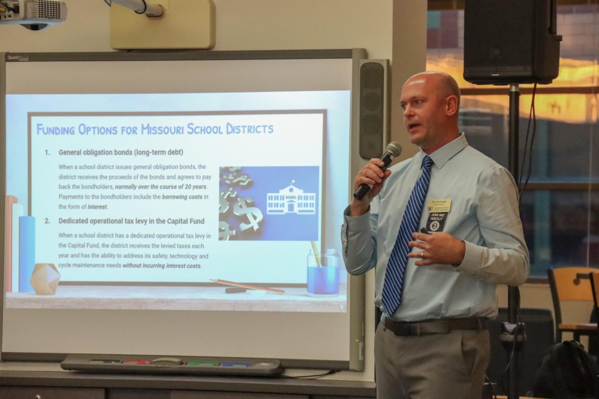 At a Town Hall Meeting Oct. 17 at Lafayette, Director of Finance Dan Steinbruegge explains the upcoming Prop 3 bond issue. Voters will decide on the issue during voting on Nov. 7.