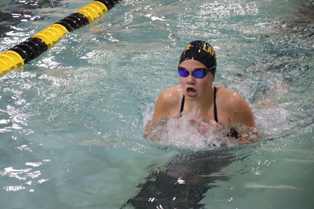 Cutting through the water, junior Talia Ramsey comes up for air during her breaststroke. Ramsey and the Lancers won their meet against Parkway Central, 94-92.