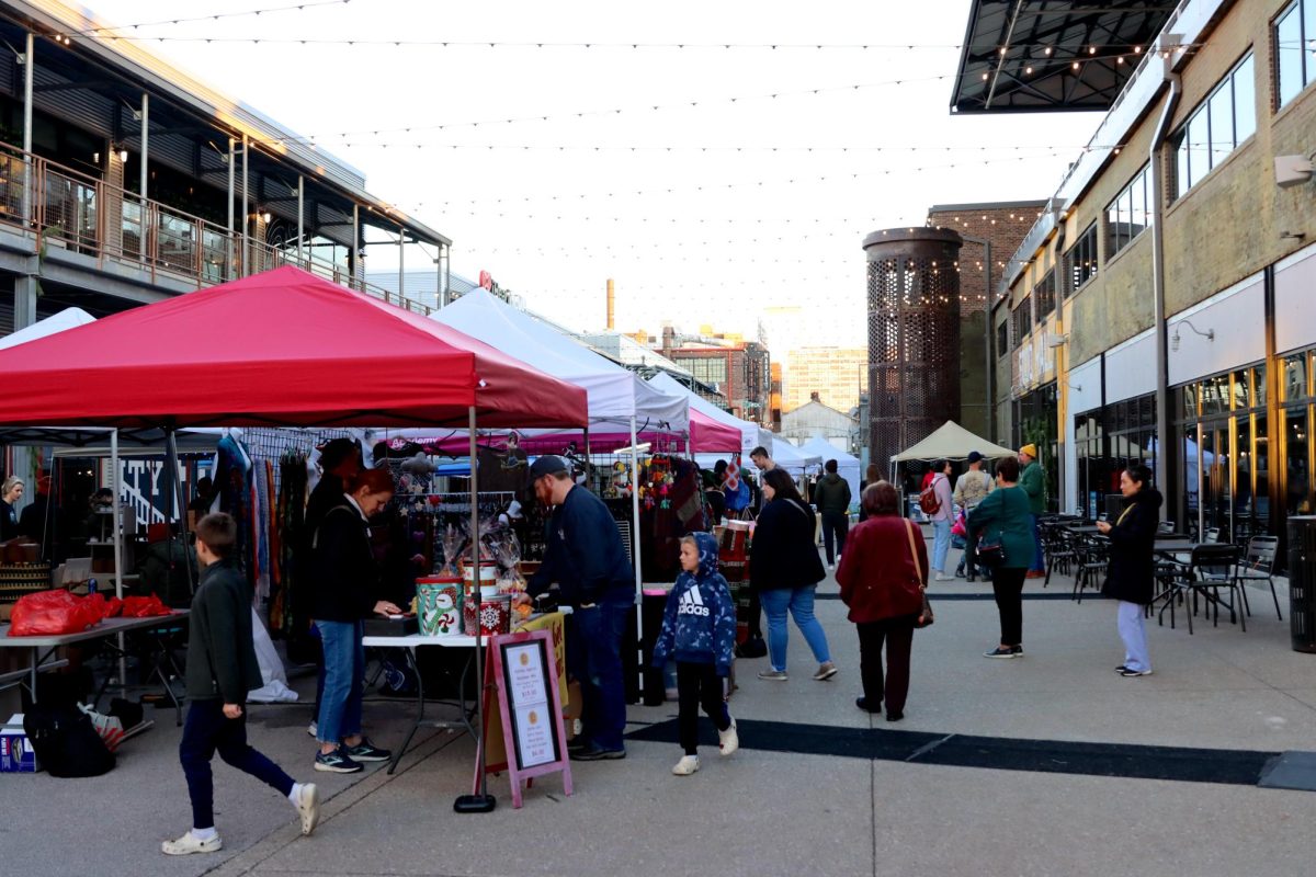 At the Winter Market on Dec. 3, vendors set up booths along Foundry Way. Papa Bear Popcorn set up their booth at the beginning of the street and sold holiday themed popcorn along with some of their best selling flavors including movie butter and caramel popcorn.