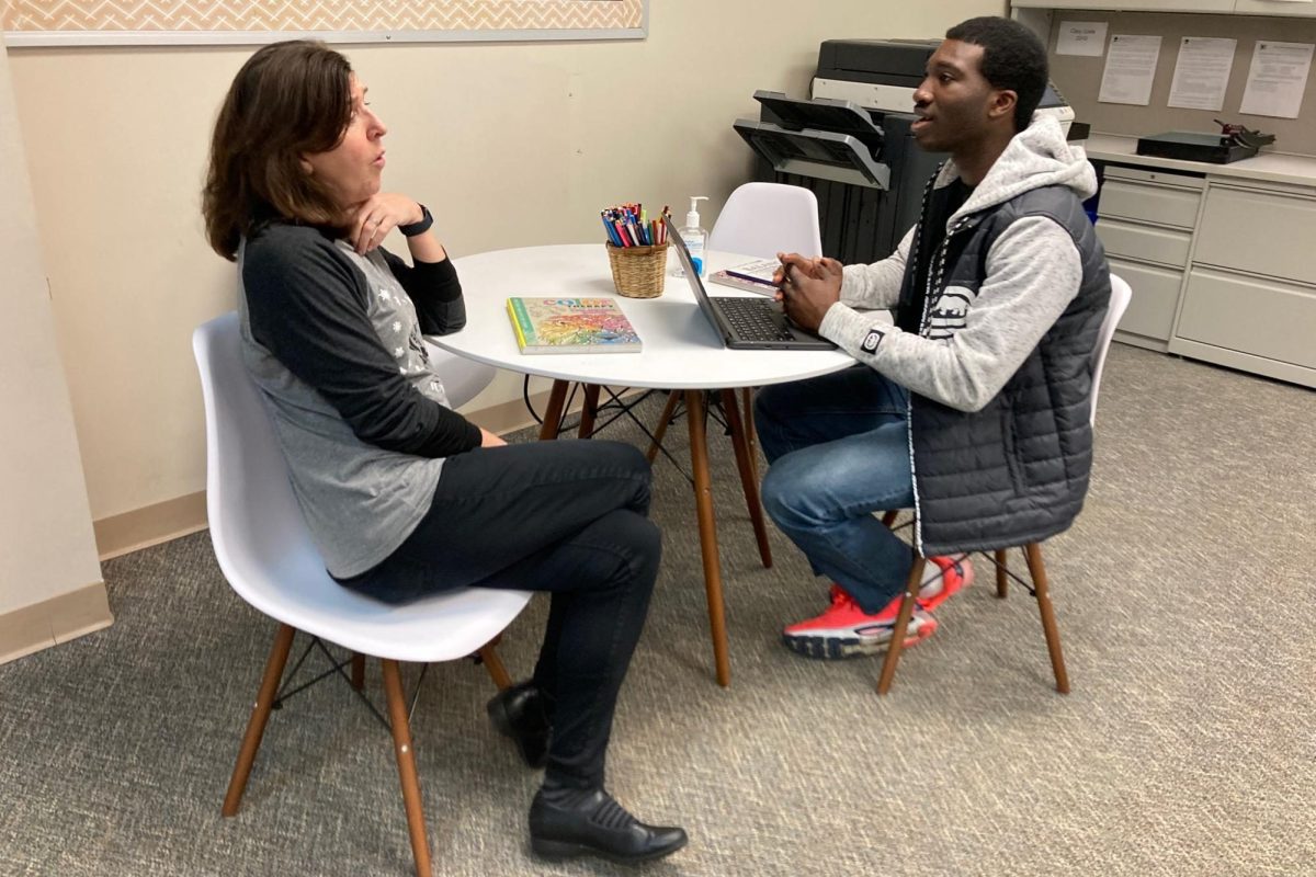 In the Guidance Office, guidance counselor Stephanie Mullins and junior CJ Woode review Woodes academic plan. Mullins said that after the first week of February, only counselors can alter students academic plans. Though, students can ask their counselor to do that.