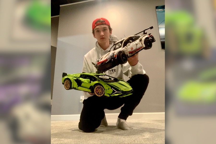 Junior Dylan Koch holds the Lamborghini Sián, one of the Technic Lego sets he built. The Sián was one of the hardest builds but also my favorite. he said. Koch no longer plays with LEGOS  but still enjoys collecting them. 