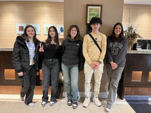 After their first night in America, French exchange students Elisa Levesque, Tessa Polano, Olivia Fontenit, Noé Kelkou and Lilia Boulvais line up in the hotel lobby. The exchange students stayed in a hotel after their Friday evening flight, they then met with their hosts Saturday morning. 