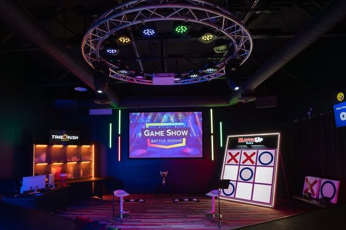 Located in The District, an entertainment hub in Chesterfield along Highway 40, Game Show Battle Rooms offers two different packages for customers to play in their studio. Host Drew Cusumano, a 2016 LHS grad,  prefers the Classic Games, which are based on games often played on television shows.
