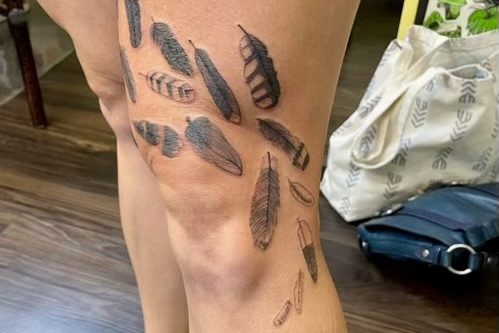 After sophomore Delaney McHale drew feathers in history class, their mom, Rockwood Valley counselor Jamie McGuire got them tattooed on her leg. The feathers dont have a large meaning to McHale but fit into McGuires passion for birds.