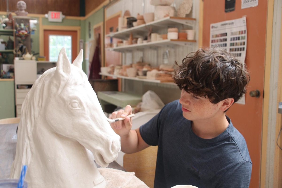 Sophomore Luke Hinton, belongs to the member at Wildwood Green Arts. The studio helps members try sculpting and various forms of pottery.