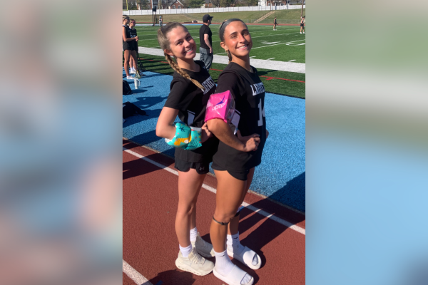 Before a lacrosse game, seniors Sierra Sachtleben and Olivia Williams wear their floaties. In water wars, floaties and goggles can be worn as protection. When a senior is wearing one of those items properly, they cant get out. 