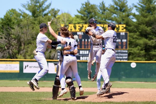 The infielders run to Sophomore Landon Matthews to celebrate after recording the final out of the Lancers 4-2 Quarterfinals victory against Seckman on May 25. The team then advanced to the Final Four, their first trip since 2000. 