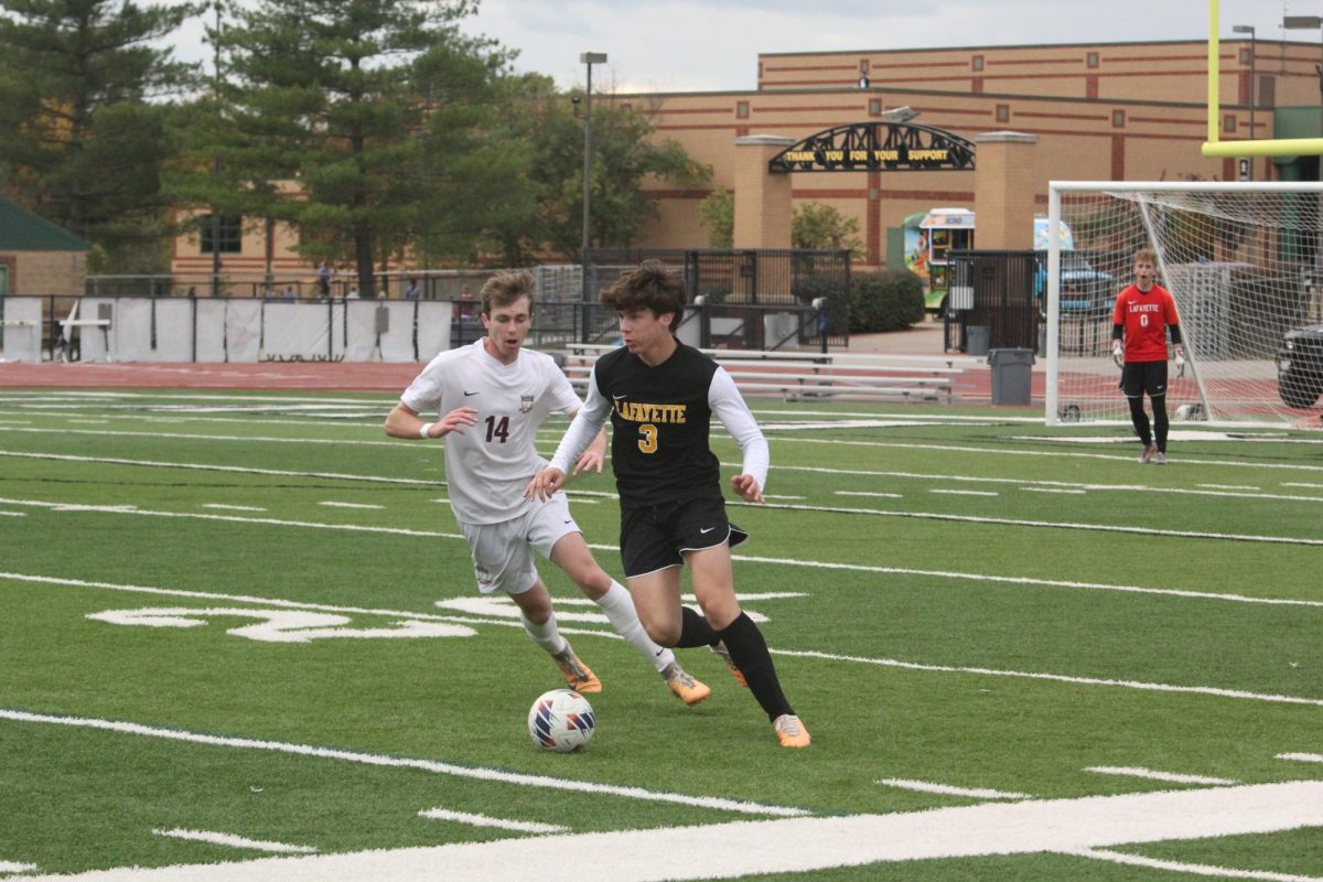 To stop the opposition attack, junior TJ Bender plays the ball forward. Bender was a key player the Lancers 13-9 record last season. “I am very excited about this year because all of my teammates are like family to me,” he said. 