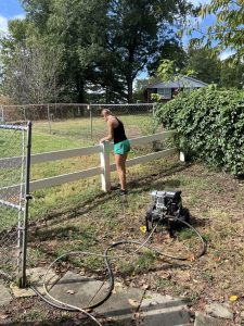 Over the weekend, when she doesn't have cross country practice, sophomore Kelly Archambeault restores a vinyl fence in Sunset Hills. " It's a lot to balance," Archambeault said. "And that's another reason why we wanted to make the business. We didn't have much time in our lives and wanted to be able to make our own hours and time for work."