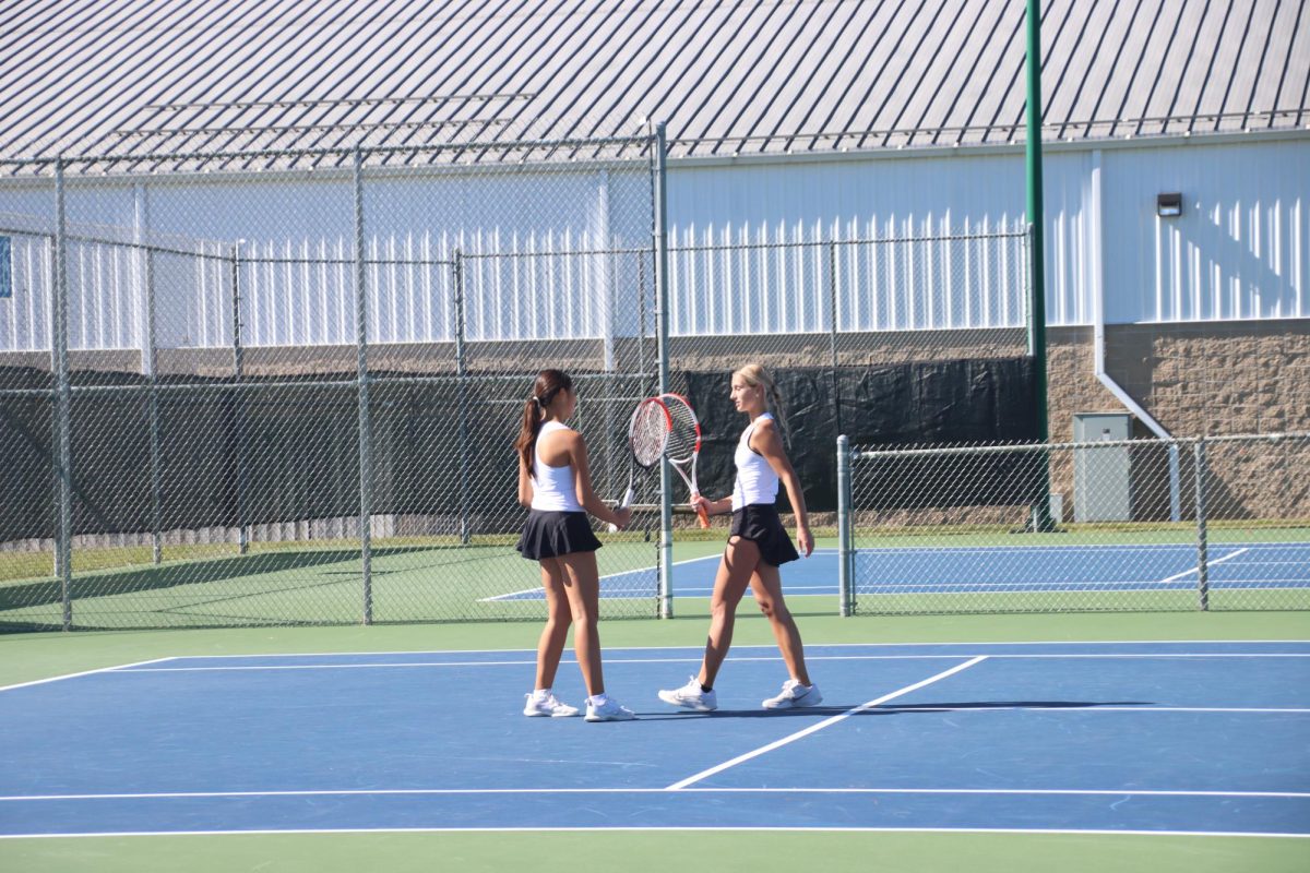 Junior Mia Yin and sophomore Mary Sublette talk to each other during the State Tournament. As a double, Yin and Sublette placed 5th at State, October 21, 2023.