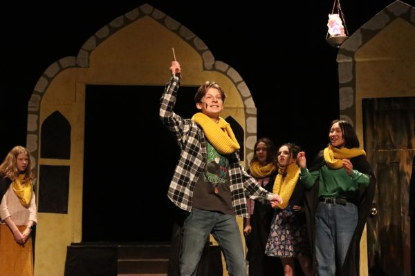 During the final dress rehearsal Oct. 16, Elwyn Dignam, who plays Wayne Hopkins, brandishes his wand in LTC's production of "Puffs".