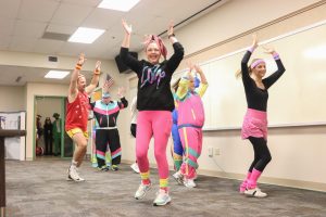 Decked out in 80's workout gear, the SSD department performs a dance routine that went on to win them the title of 'Best Group Costume'.