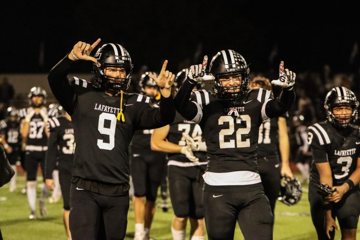 Senior linebackers Malan Graham and Brady Calderon pose for a photo.