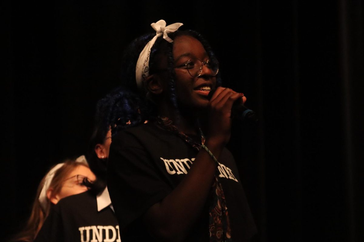 During a game of "Beastie Boys" senior Ella Luvai raps into the microphone. Undefined members were given a name and had to make sentences that rhymed based off of that name.