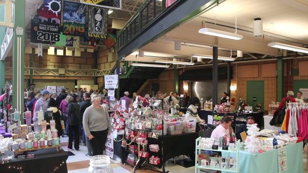 Community members browse items for sale during the Marketplace Craft Fair, from many available vendors.