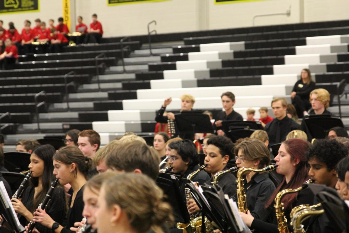 At the back of the band, percussionist ____ plays the sleigh bells during the final piece, "Sleigh Ride". 