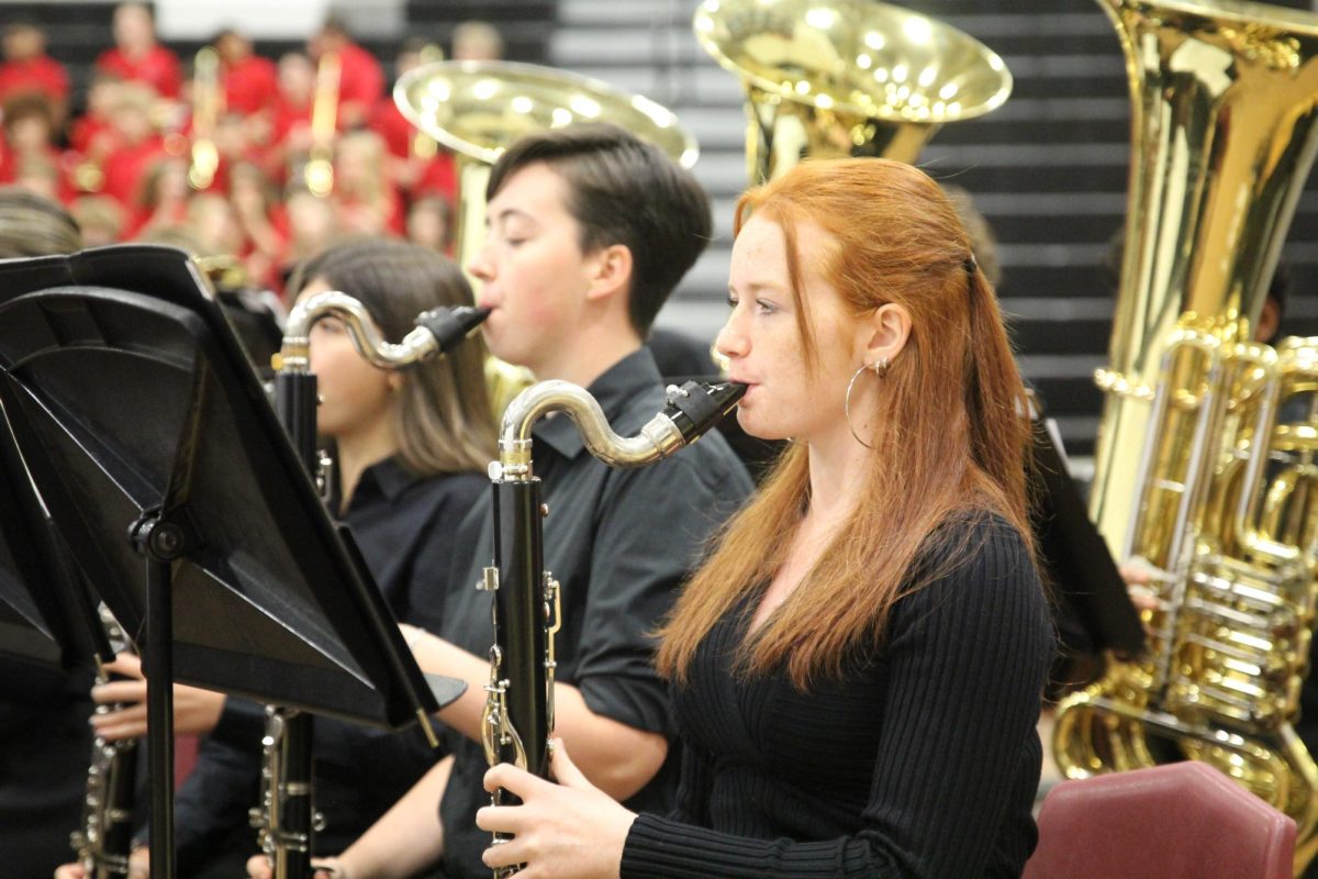 Lafayette’s three levels of band combine for the first time in the year during the MIOS concert. Senior Grace Lankford and freshman MJ Clancy play bass clarinet as the band opens with “The Mandalorian.”