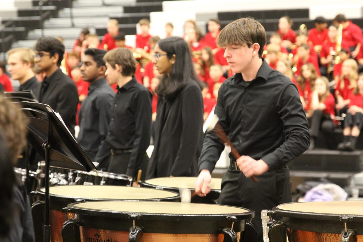 Sophomore Dean Klawiter plays the drums during "The Mandalorian."