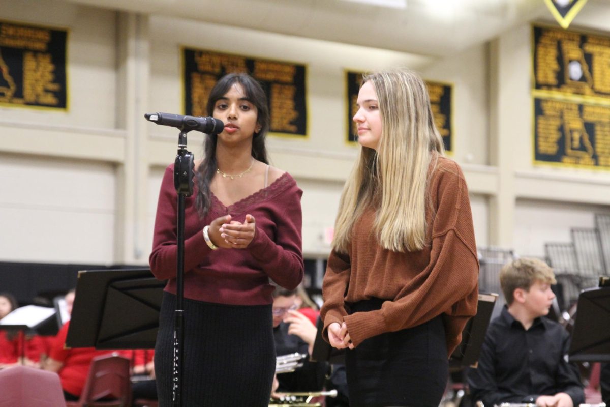 After being introduced by music teacher Brad Balog, STL Spark members senior Avery Townsend and junior Mahi Chechani talk about Dressember, an organization that STL Spark partners with for human trafficking awareness.