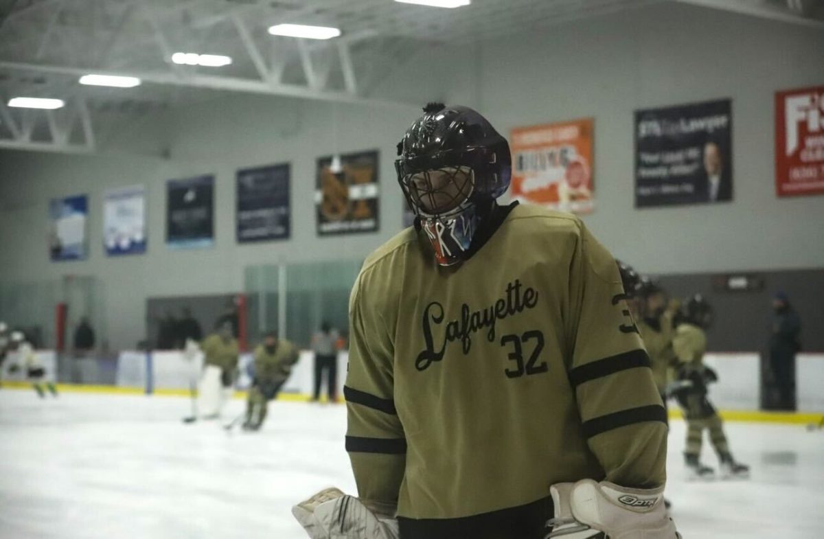 Senior goalie Blake Parks stands by the goal.