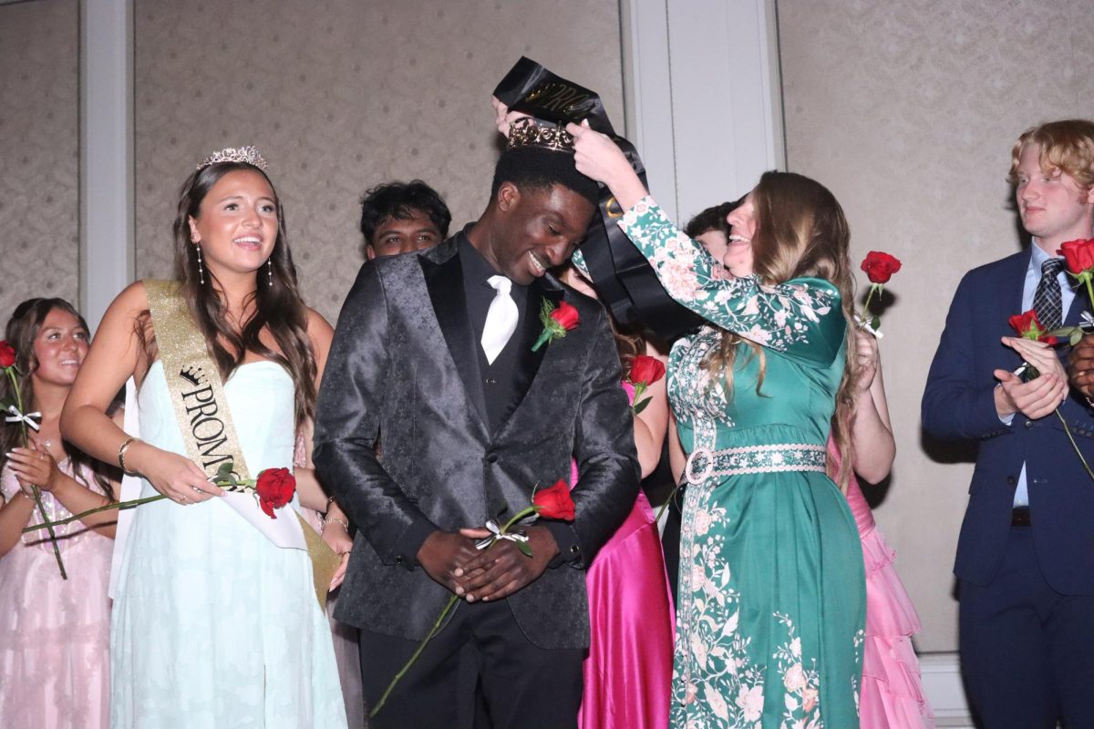 Senior CJ Woode is crowned as Prom king, 