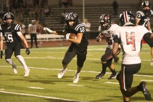 On Aug. 20, 2024, junior running back Cody Keen drives the ball downfield against Parkway Central. The Lancers won 58-0.