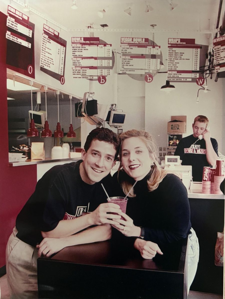 To commemorate the opening of Crazy Bowls & Wraps, Gail and Keith Kitsis take a photo in their restaurant in 1999.