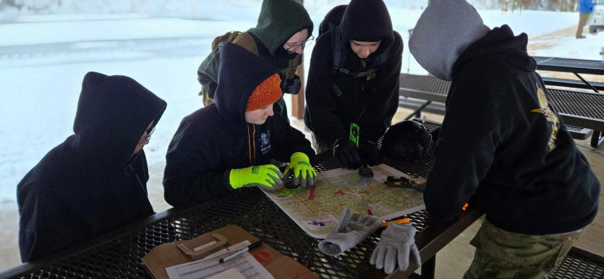 Orienteering Club members prepare for the "Tame the Dragon" event at Lake of the Ozarks State Park, Feb. 22, 2025. The team placed 6th at the event among all teams, “It was really challenging but that’s why it was fun, and it was a great experience for me and all the people participating,” junior orienteering club member Savannah Marta said.