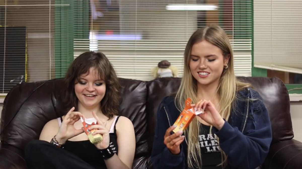 Lancer Feed staffers senior Audrey Thomas and junior Marlie French open Sonny Angel blind boxes.