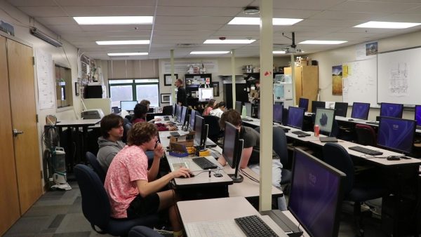 Students work on their personal engineering capstone projects and receive feedback to improve their designs.