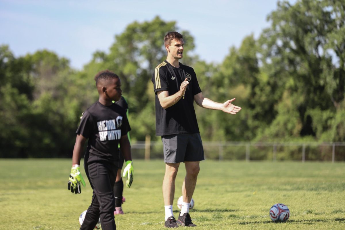 While observing a goalkeeping drill, founder and St. Louis City SC goalkeeper Ben Lundt claps in celebration after a good save was made by one of the attendees. In the 2025 MLS season, Lundt recorded 32 saves and two clean sheets for St. Louis City, according to ESPN.